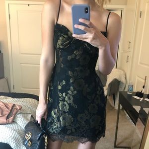 Black and gold lace dress